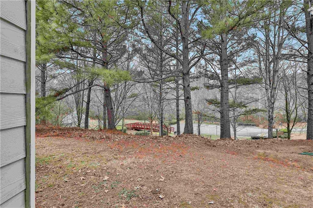 4605 Raven Wood Loop Union City, GA 30291 - Photo 21 of 24 a view of a yard with a tree