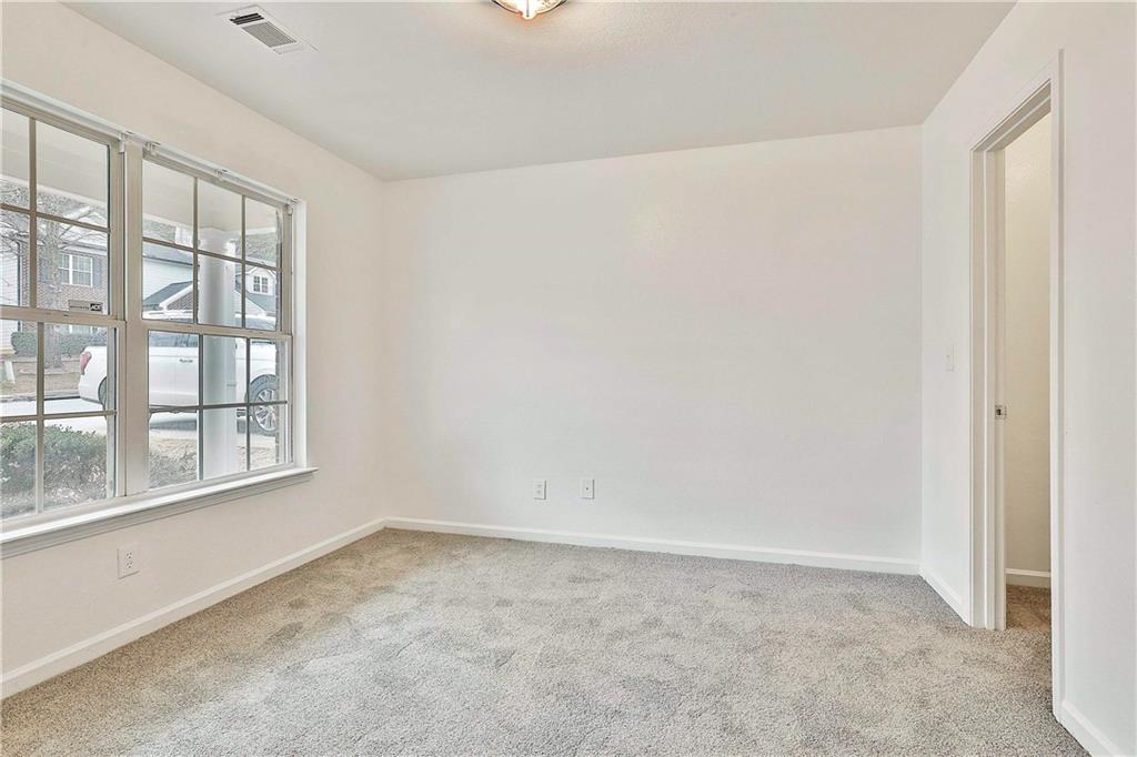 4605 Raven Wood Loop Union City, GA 30291 - Photo 5 of 24 an empty room with a window