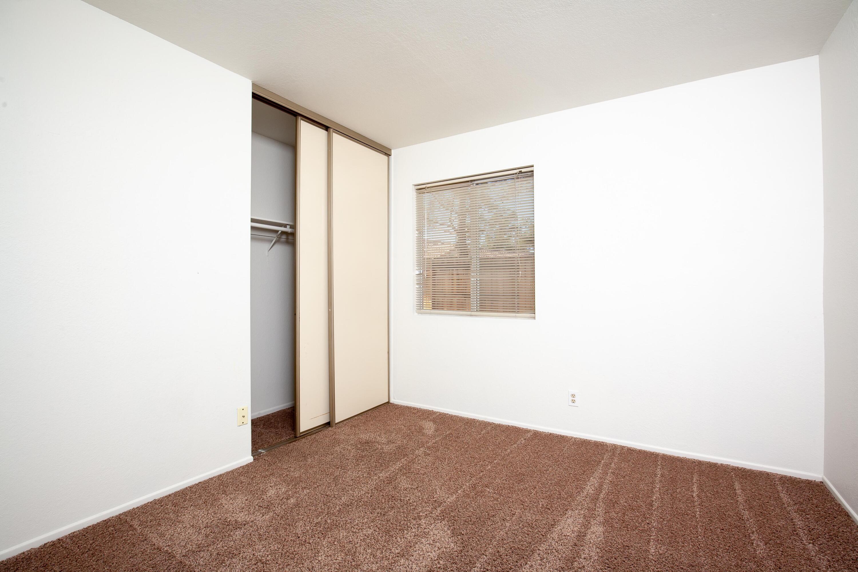 1628 Kings Road Palmdale, CA 93551 - Photo 14 of 22 a view of an empty room with a window