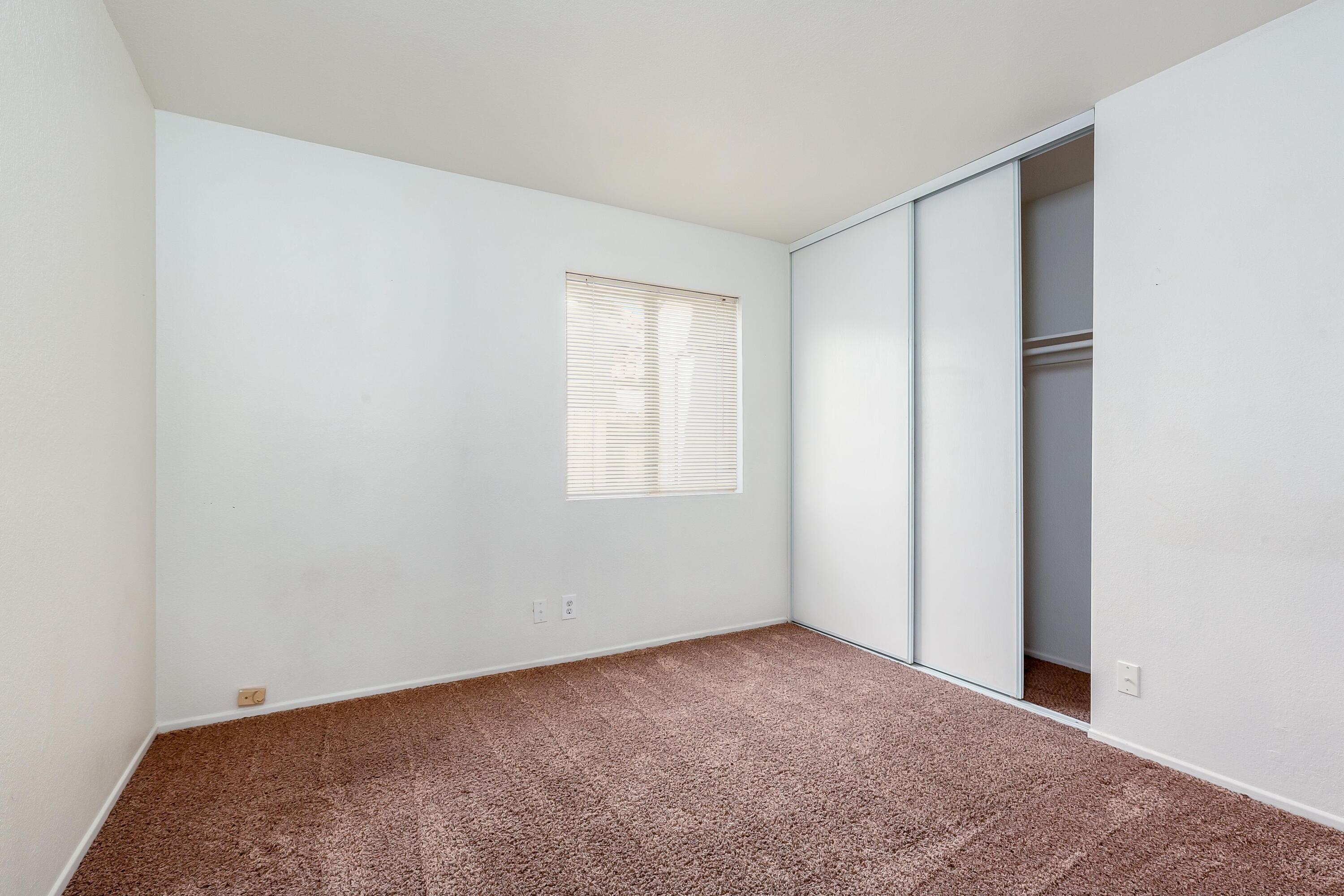 1628 Kings Road Palmdale, CA 93551 - Photo 15 of 22 a view of an empty room with a window