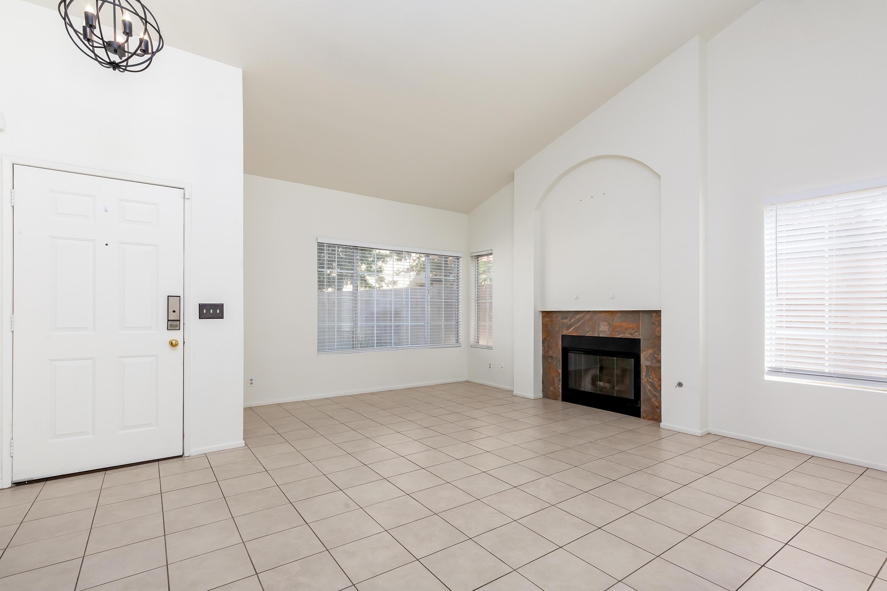 1628 Kings Road Palmdale, CA 93551 - Photo 4 of 22 an empty room with windows