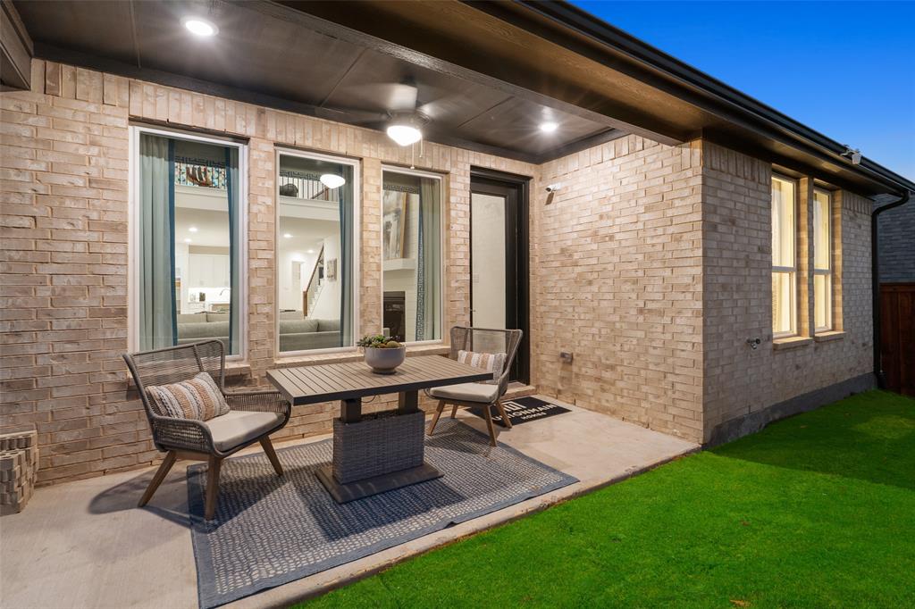 117 Pintail Lane Rhome, TX 76078 - Photo 27 of 29 a view of a patio with chairs and table in patio