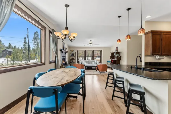 a dining room filled with furniture and window