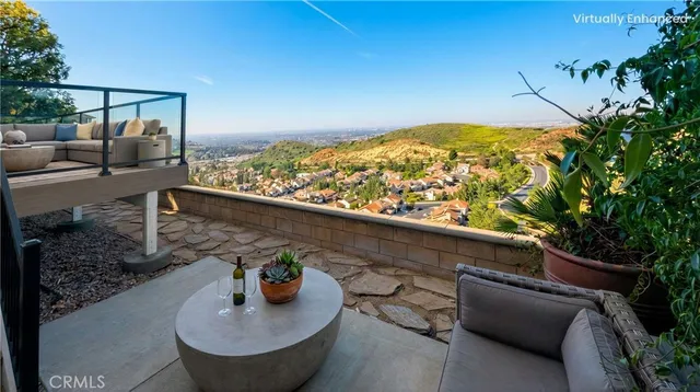 swimming pool view with a seating space