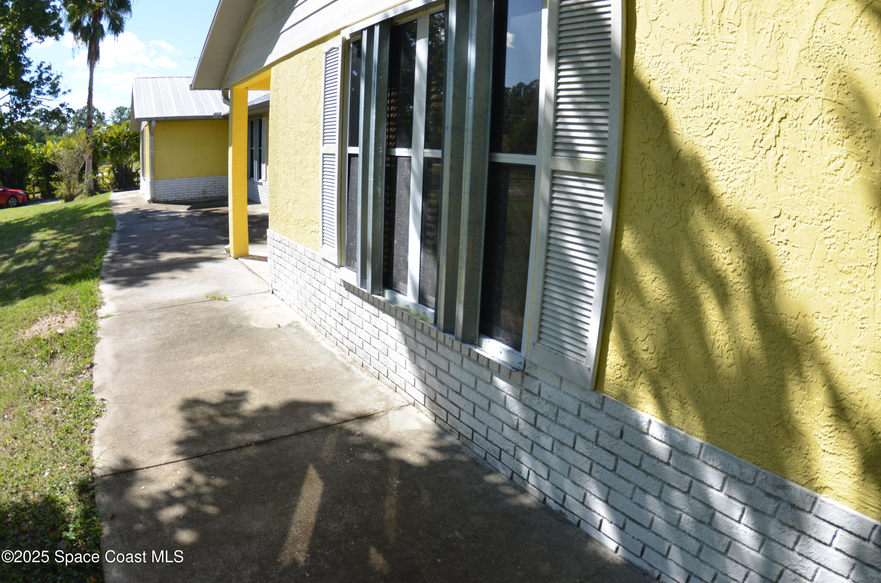 3600 Corey Road Malabar, FL 32950 - Photo 14 of 46 a view of backyard of the house