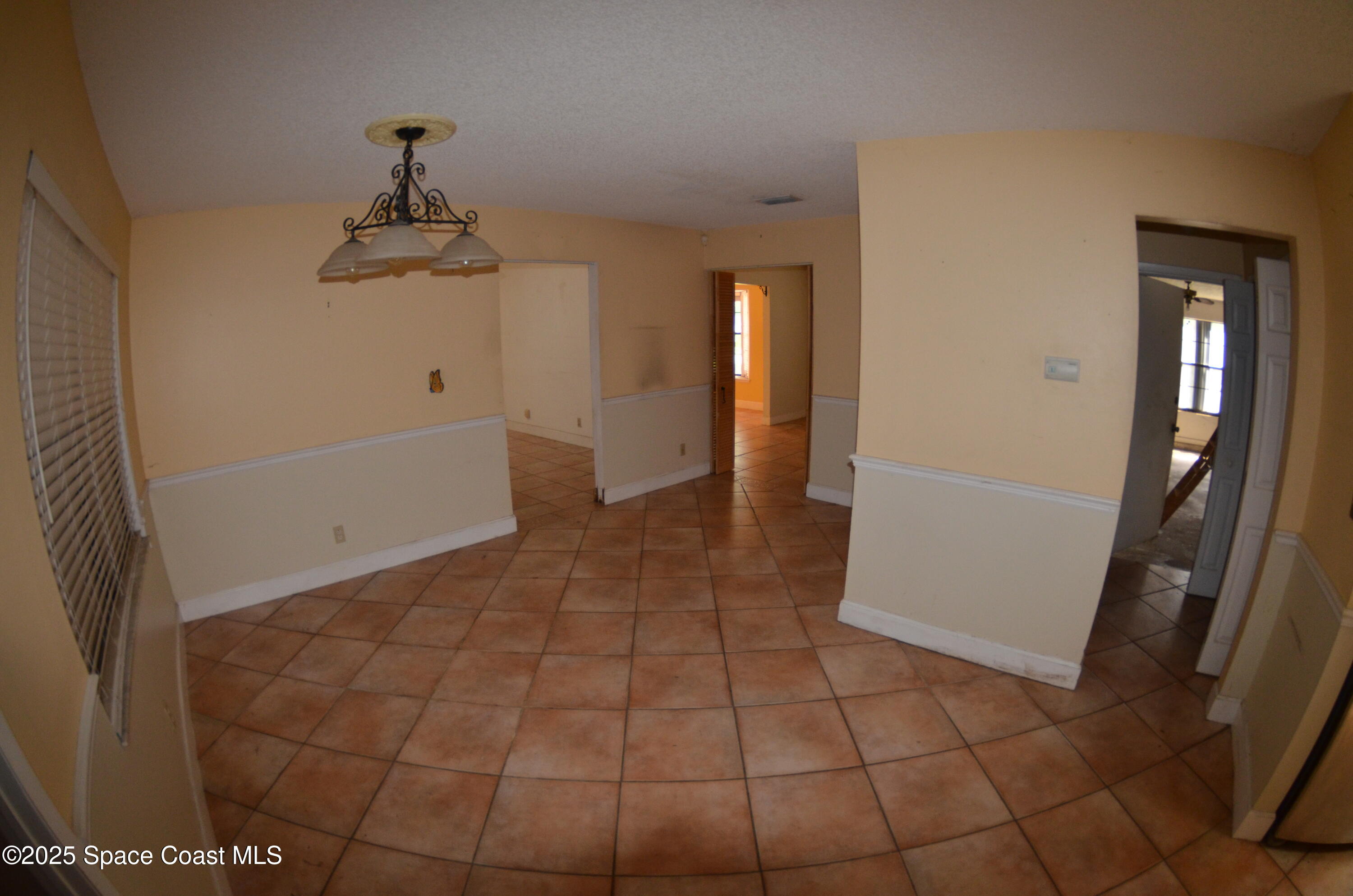 3600 Corey Road Malabar, FL 32950 - Photo 29 of 46 a view of empty room with front door