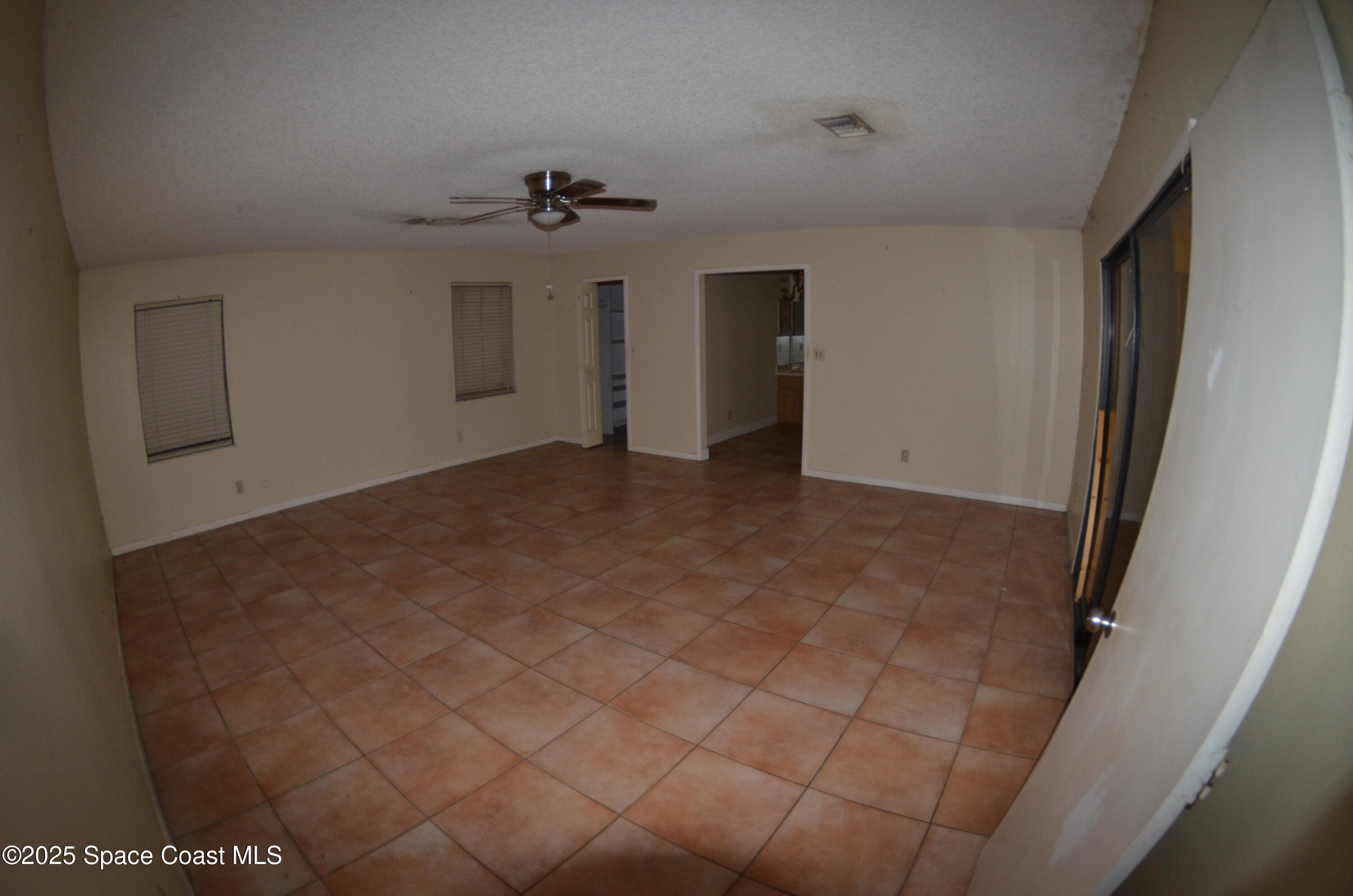 3600 Corey Road Malabar, FL 32950 - Photo 31 of 46 a view of a livingroom with a chandelier