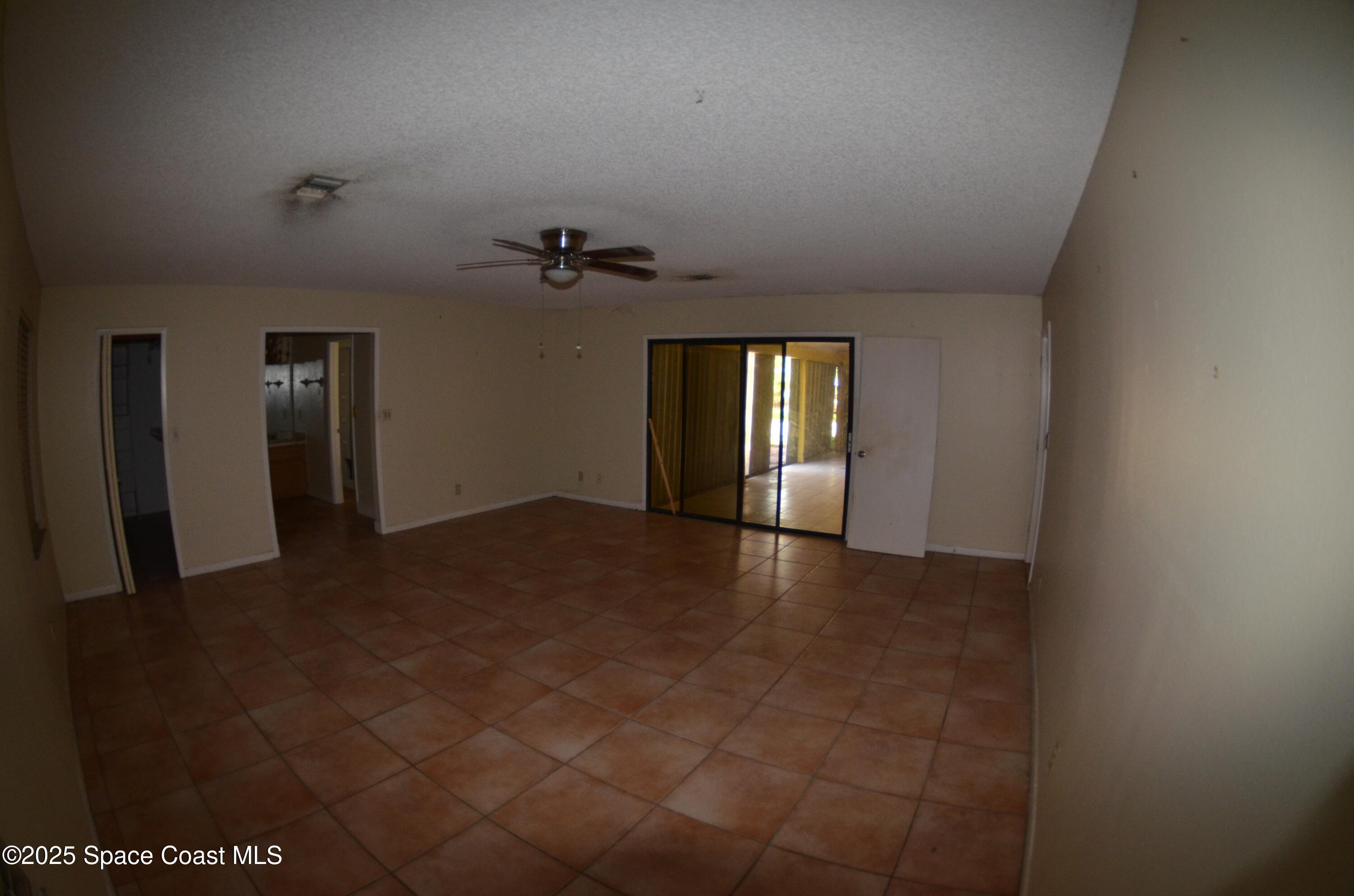 3600 Corey Road Malabar, FL 32950 - Photo 32 of 46 a view of an empty room with a window