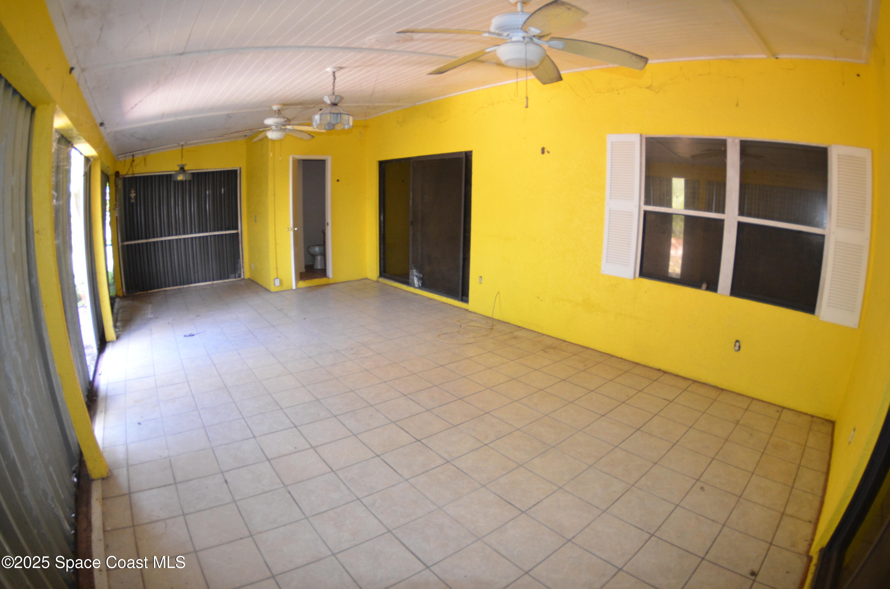 3600 Corey Road Malabar, FL 32950 - Photo 37 of 46 a view of empty room with wooden floor