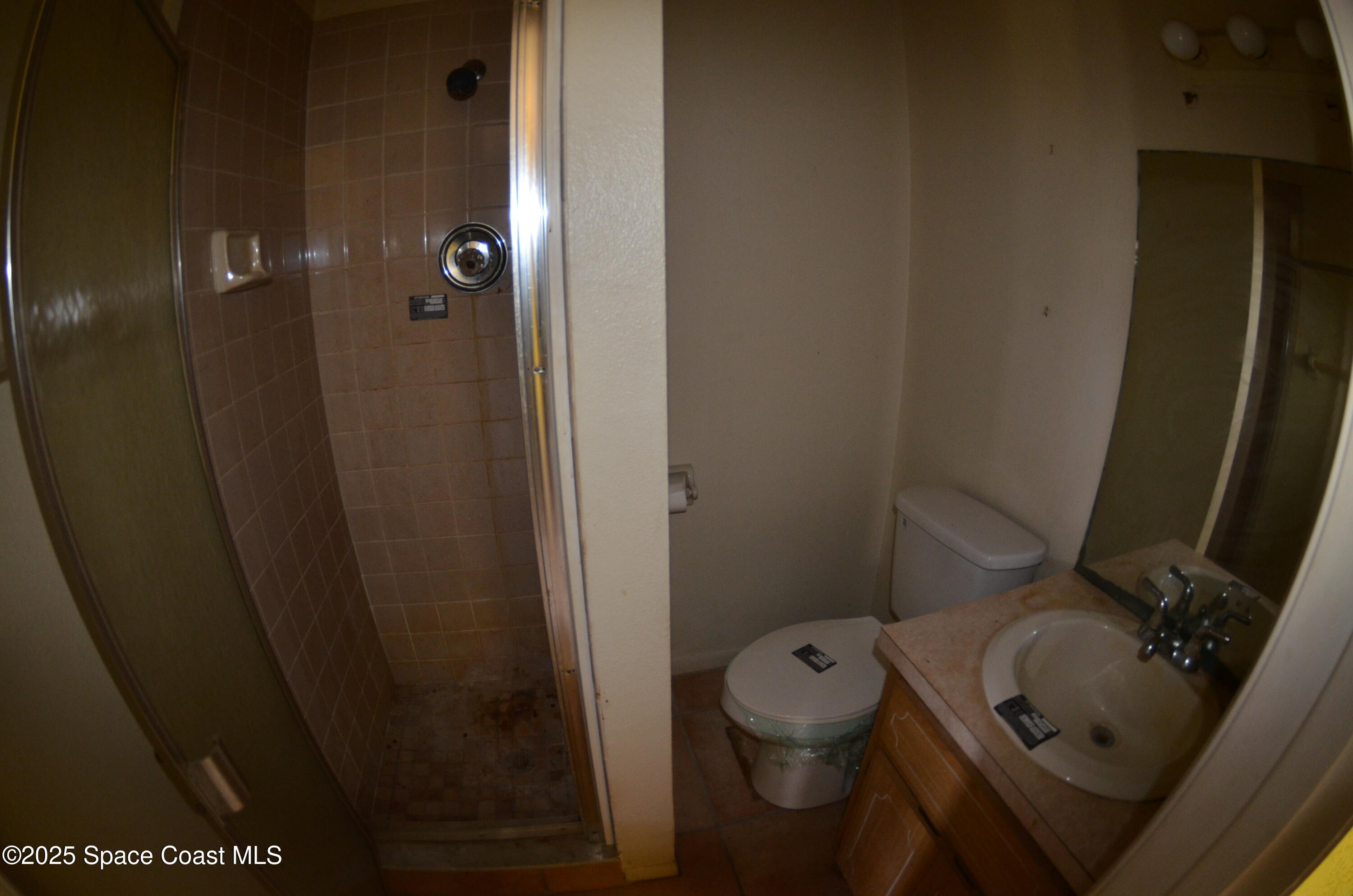3600 Corey Road Malabar, FL 32950 - Photo 38 of 46 a bathroom with a sink and toilet