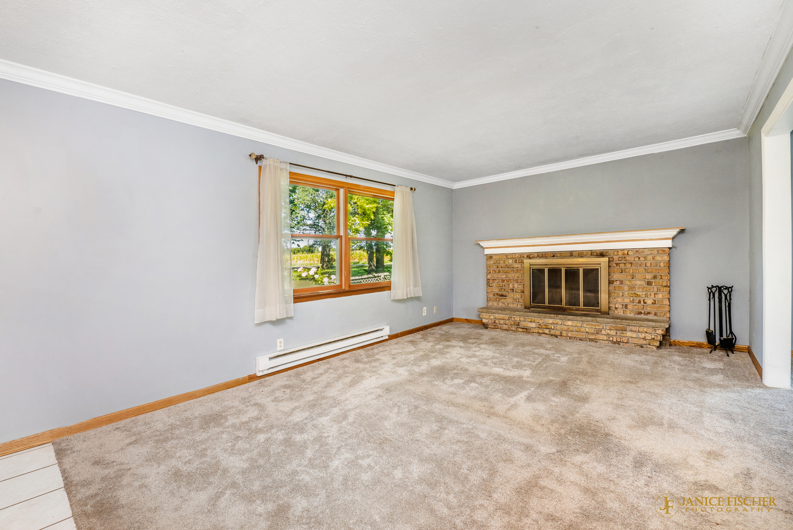 8488 Grange Hall Road Garden Prairie, IL 61038 - Photo 5 of 10 an empty room with windows