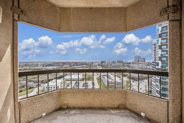a swimming pool with outdoor seating and yard