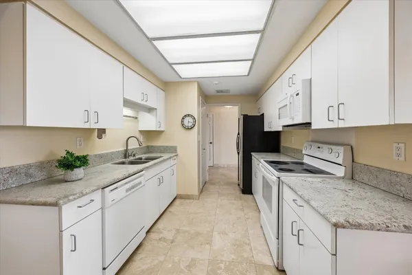 a view of a storage and utility room in a hall
