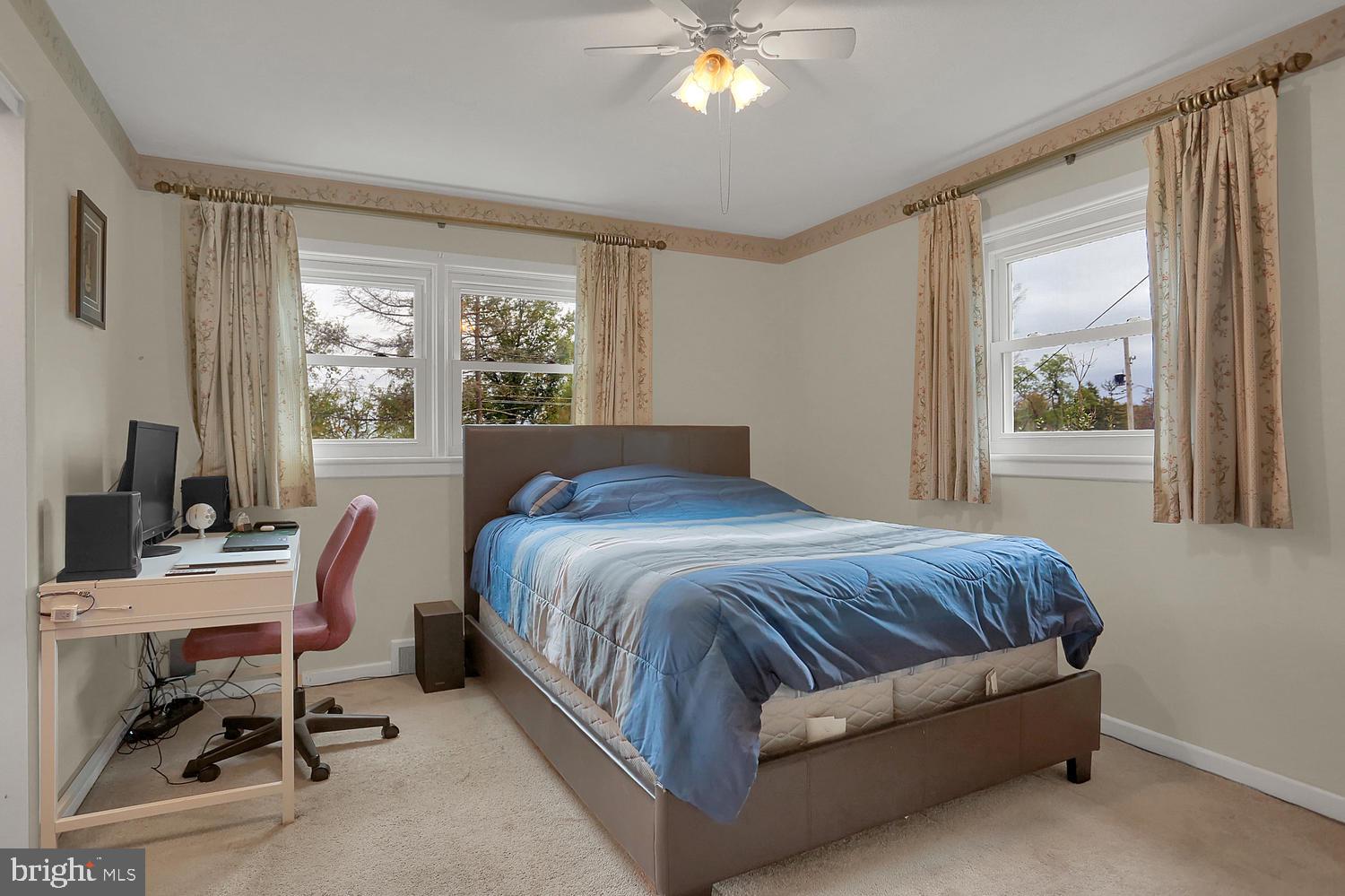 113 Country Club Road Red Lion, PA 17356 - Photo 13 of 31 a bedroom with a bed a table and chair
