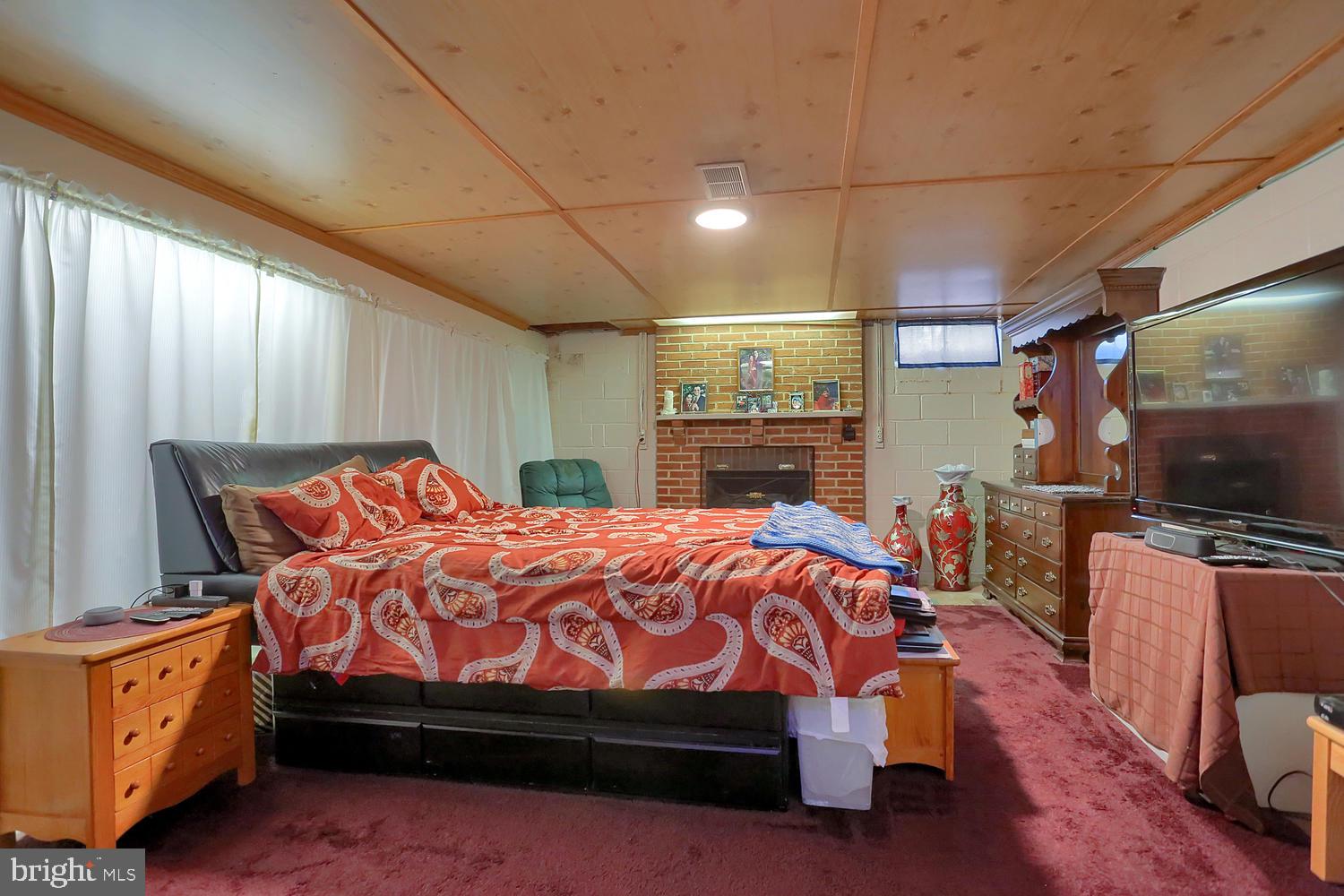 113 Country Club Road Red Lion, PA 17356 - Photo 20 of 31 a bed room with a bed and a television