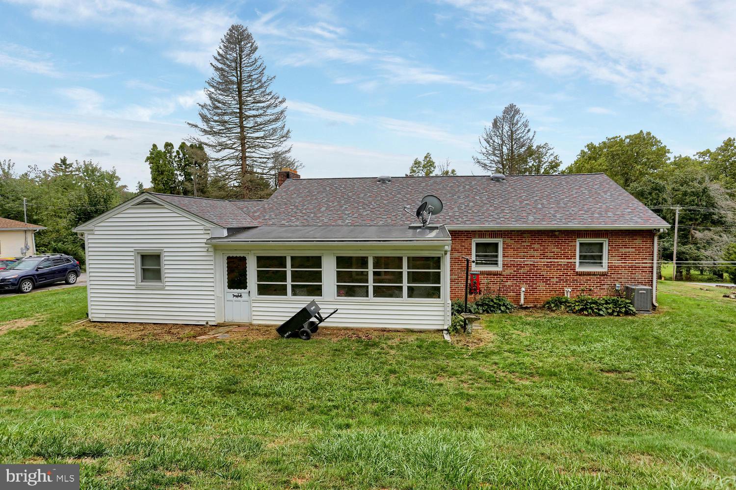 113 Country Club Road Red Lion, PA 17356 - Photo 24 of 31 front view of a house with a yard
