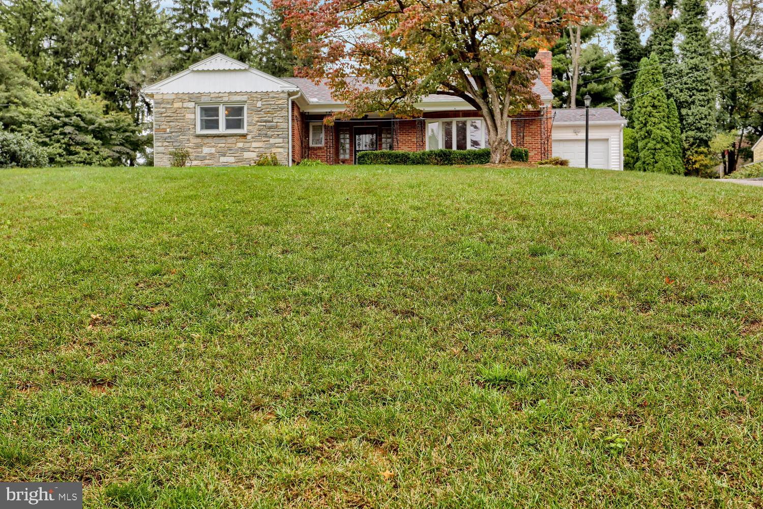 113 Country Club Road Red Lion, PA 17356 - Photo 28 of 31 a front view of a house with a garden