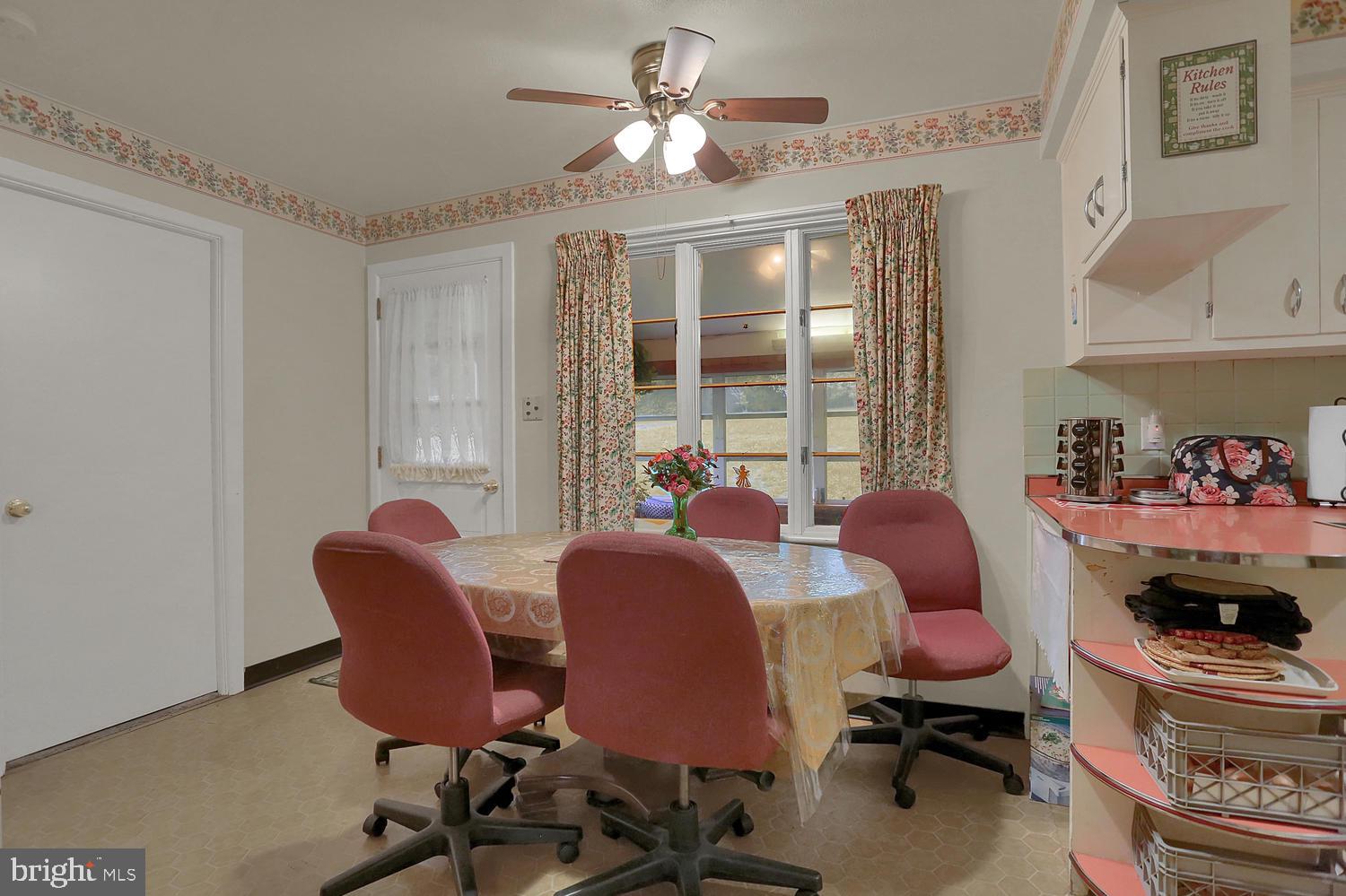 113 Country Club Road Red Lion, PA 17356 - Photo 6 of 31 a view of a dining room with furniture a chandelier and a window