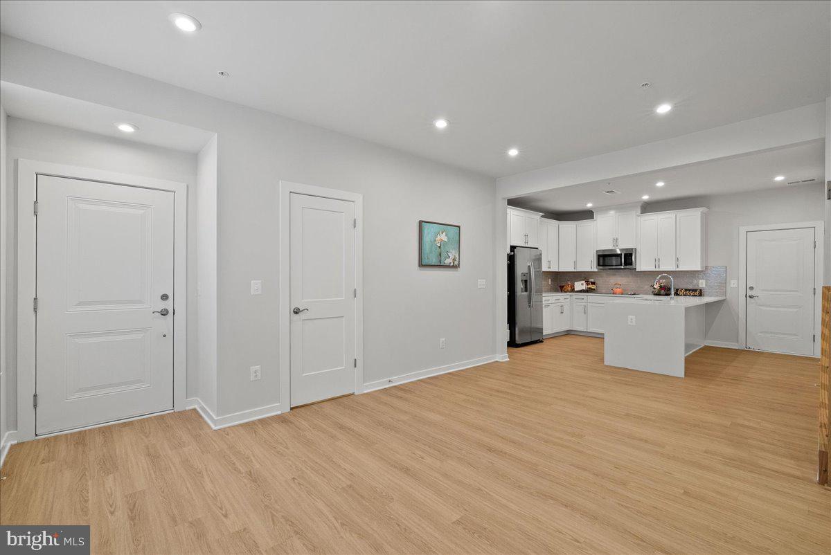 4128 Legato Road, Unit 53 Fairfax, VA 22033 - Photo 12 of 39 a view of kitchen with wooden floor