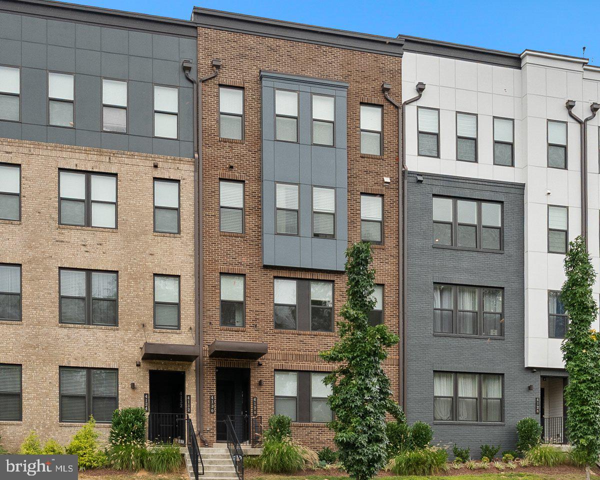 4128 Legato Road, Unit 53 Fairfax, VA 22033 - Photo 2 of 39 a front view of a multi story building