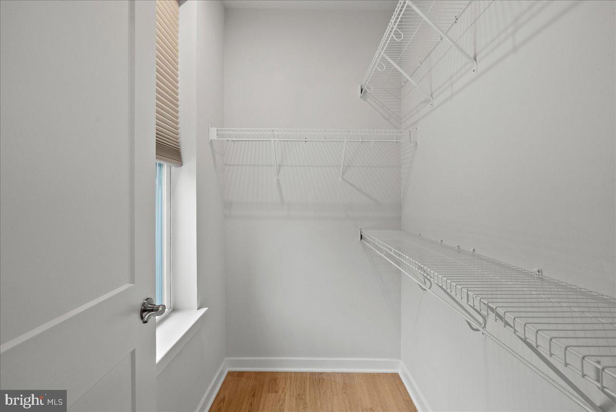 4128 Legato Road, Unit 53 Fairfax, VA 22033 - Photo 29 of 39 a view of a room with rack on the wall