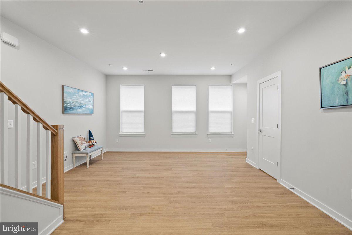 4128 Legato Road, Unit 53 Fairfax, VA 22033 - Photo 8 of 39 a living room with a large window