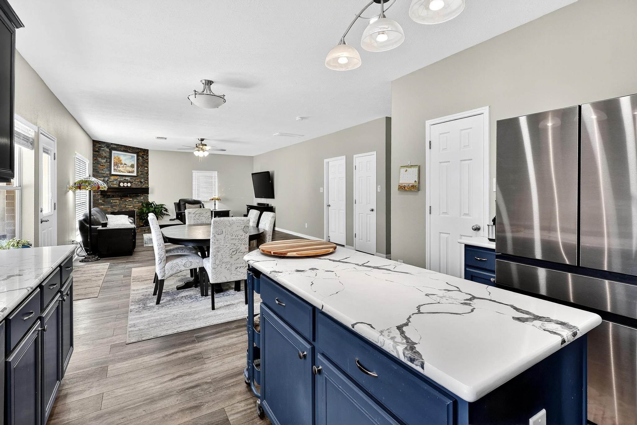 7622 McCormick Mill Court Houston, TX 77095 - Photo 13 of 40 a living room with granite countertop furniture and wooden floor