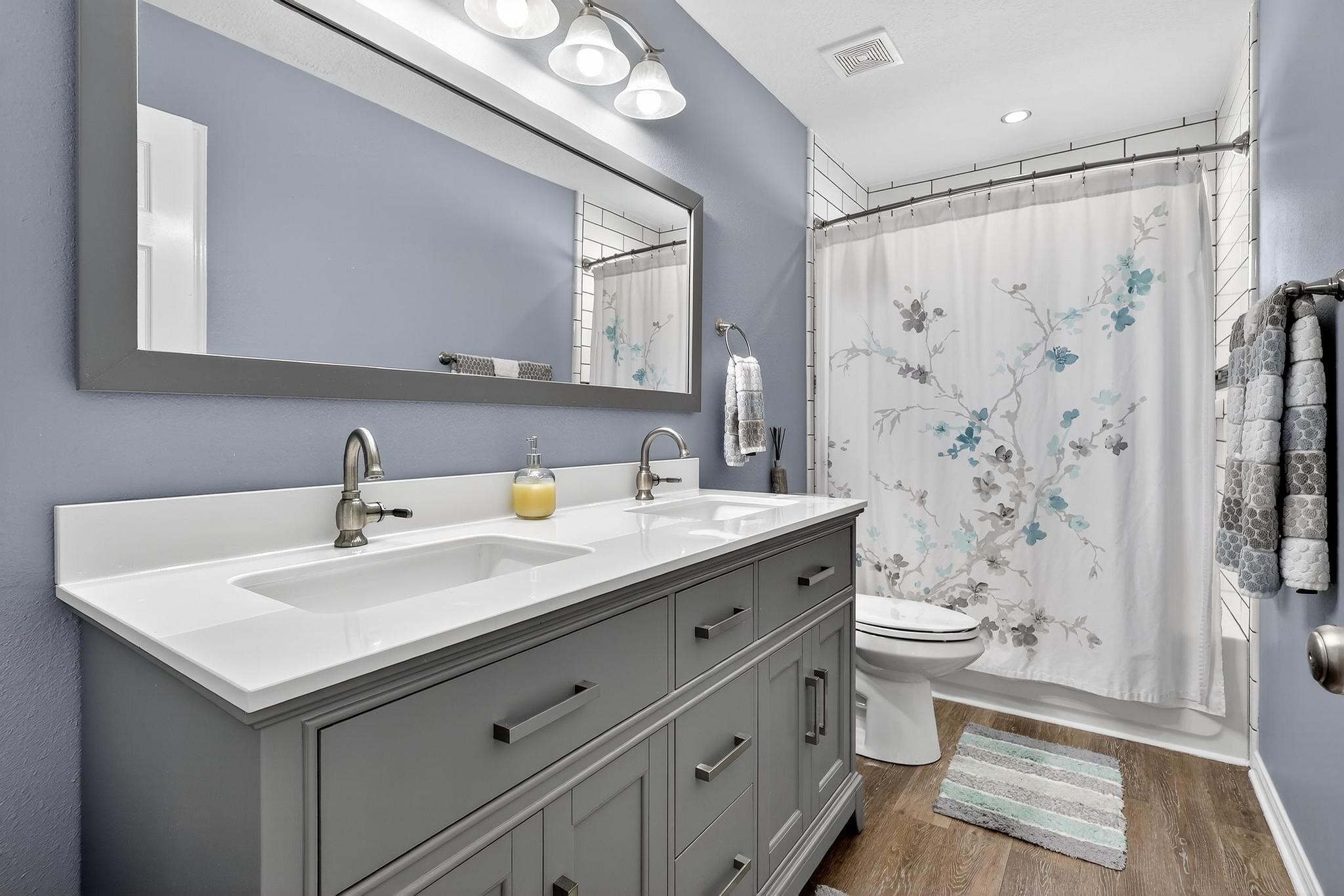 7622 McCormick Mill Court Houston, TX 77095 - Photo 36 of 40 a bathroom with a sink a toilet and shower