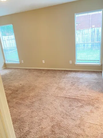 a view of a room with an empty room