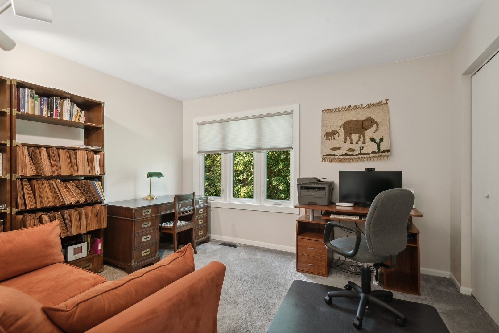 816 Echo Lane Glenview, IL 60025 - Photo 14 of 25 a view of a livingroom with workspace and a window