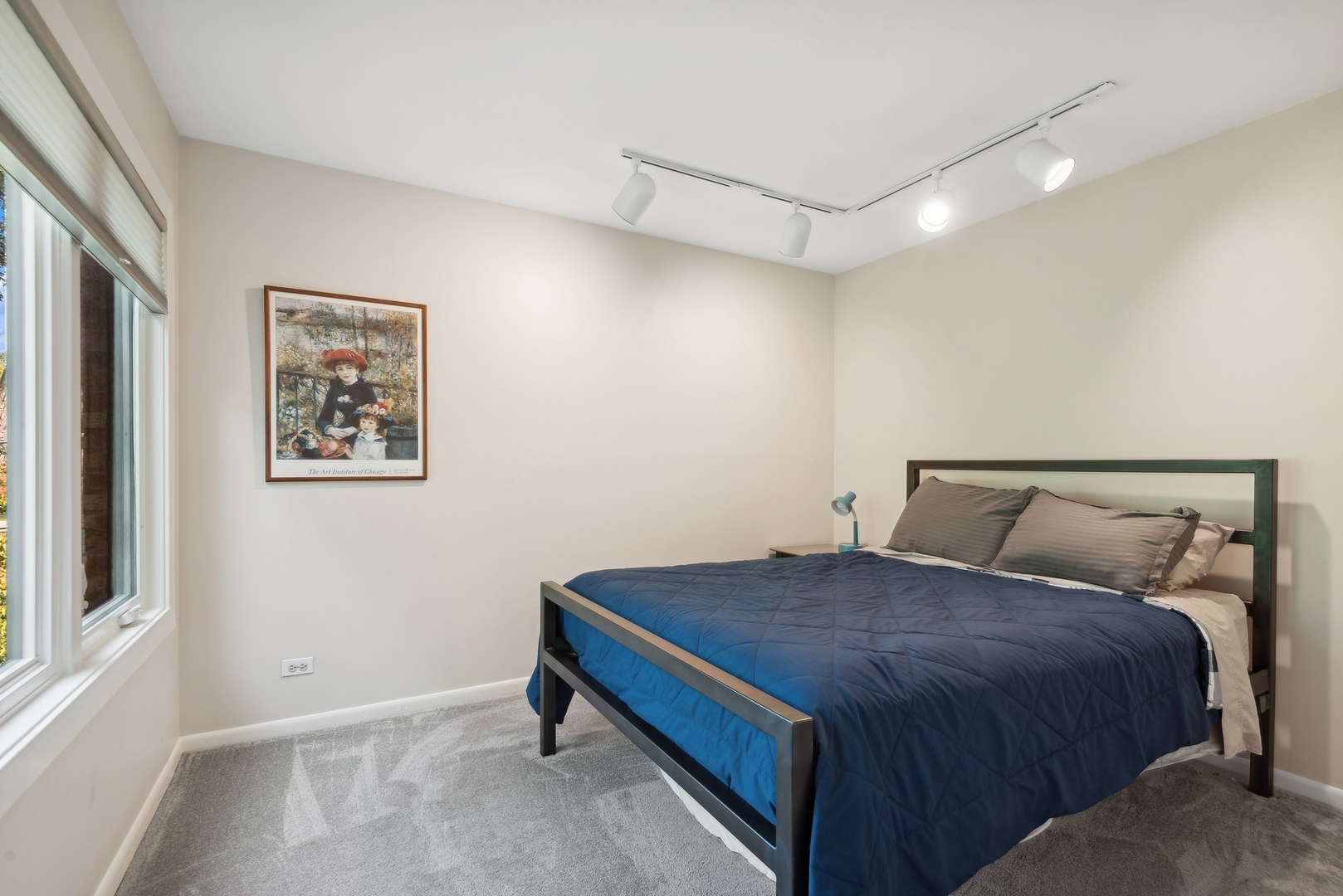 816 Echo Lane Glenview, IL 60025 - Photo 15 of 25 a bedroom with a bed and a window