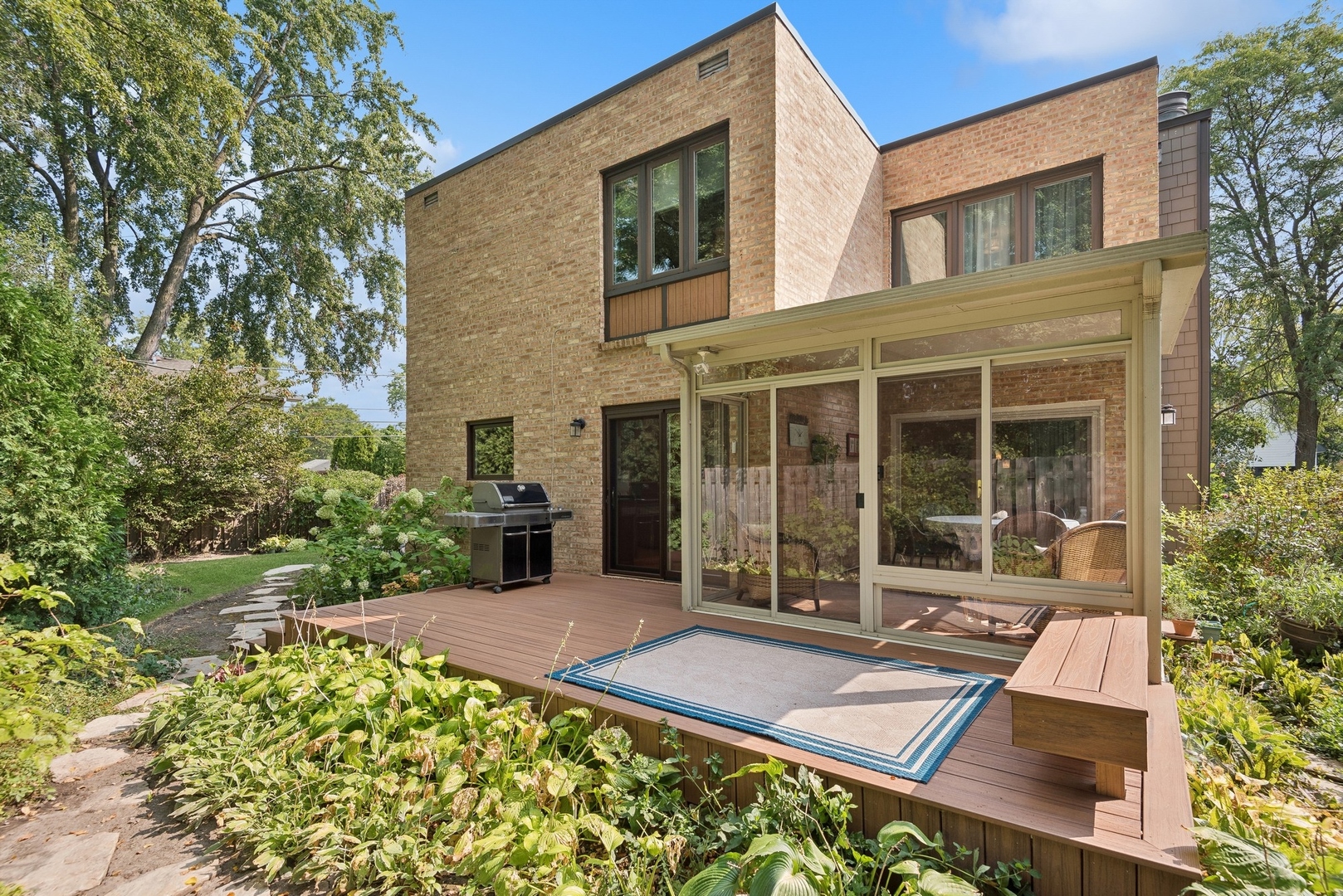 816 Echo Lane Glenview, IL 60025 - Photo 19 of 25 front view of a house with a garden
