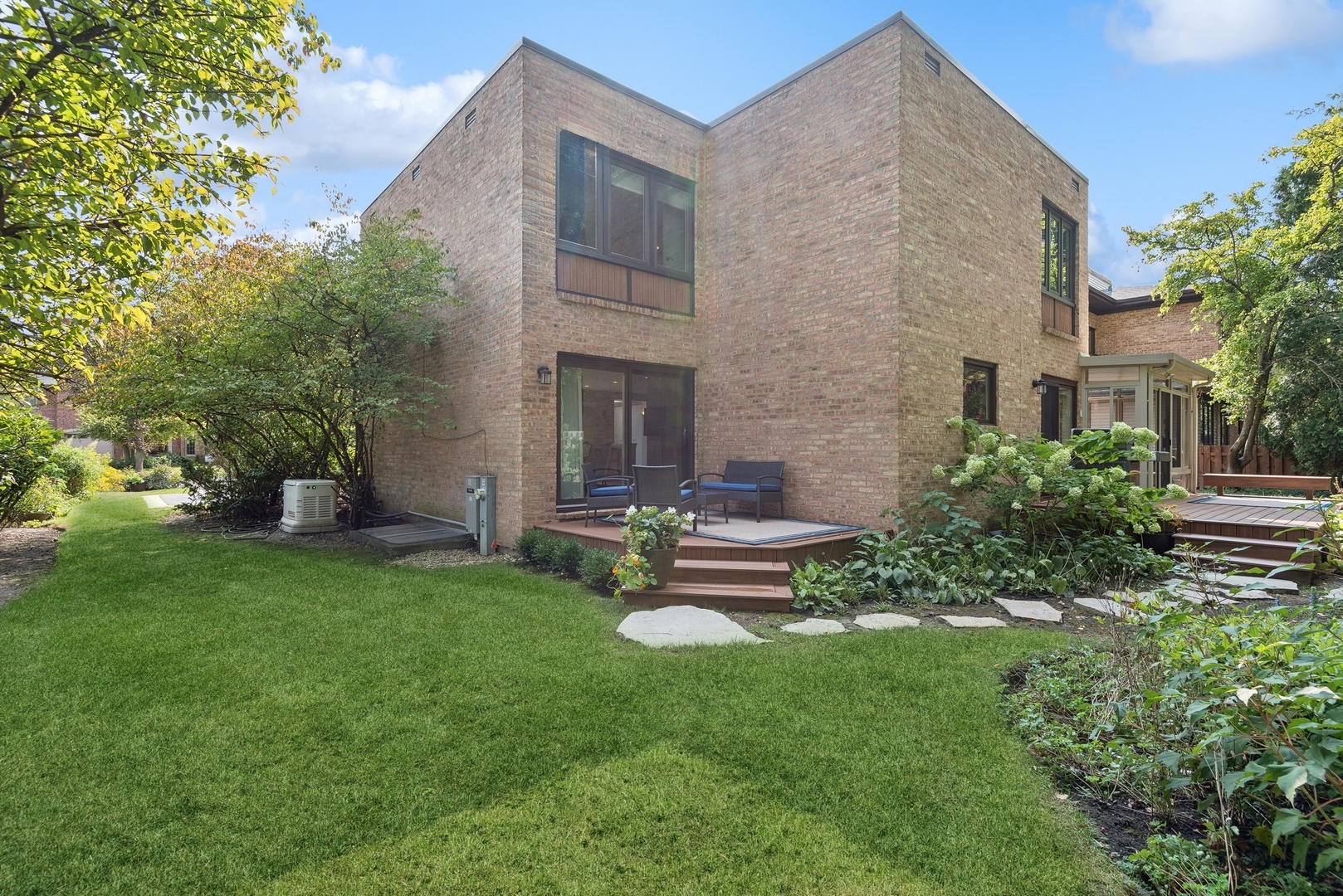 816 Echo Lane Glenview, IL 60025 - Photo 21 of 25 a view of a house with a backyard and sitting area