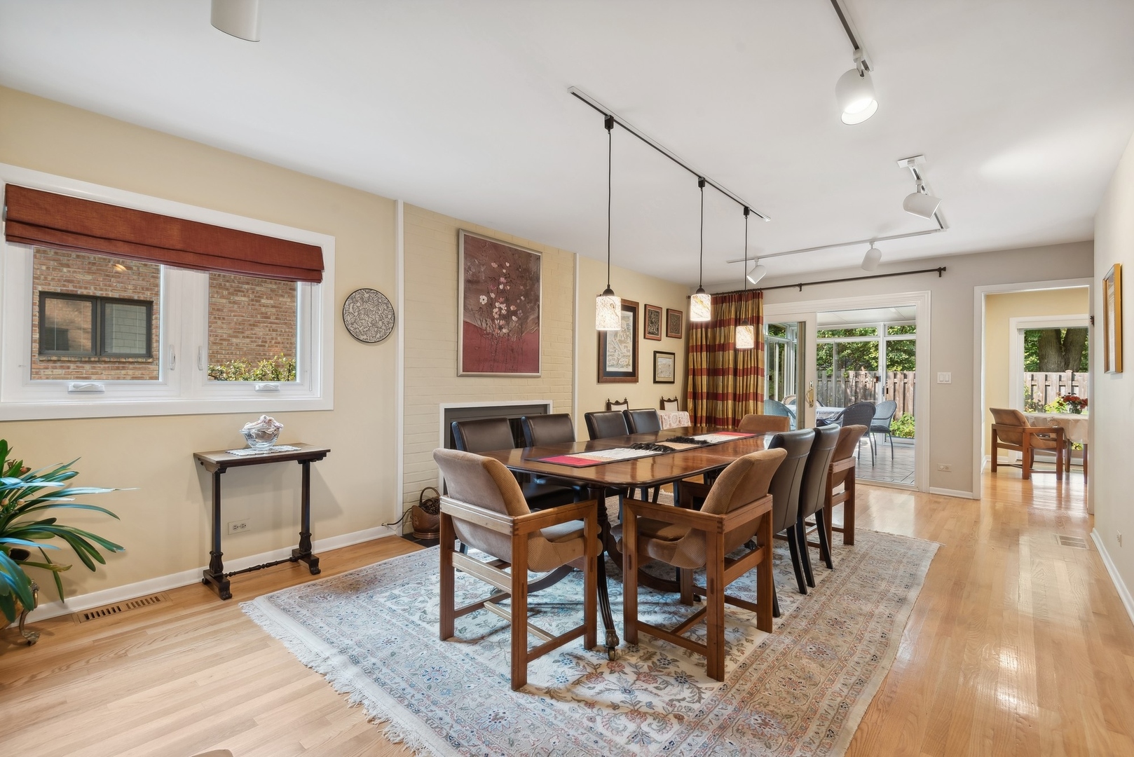 816 Echo Lane Glenview, IL 60025 - Photo 8 of 25 a view of a dining room with furniture and wooden floor