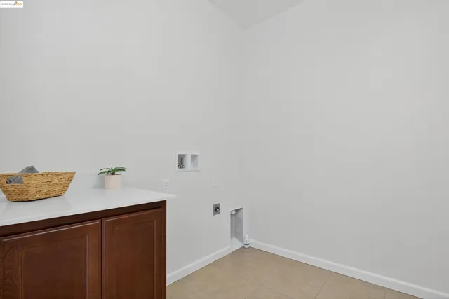 a bathroom with a sink and cabinets