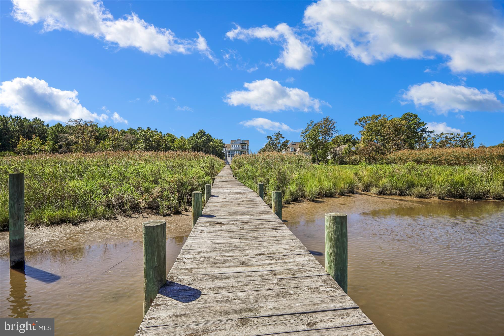 635 Dominion Road Chester, MD 21619 - Photo 13 of 50 a view of a lake with a mountain in the back