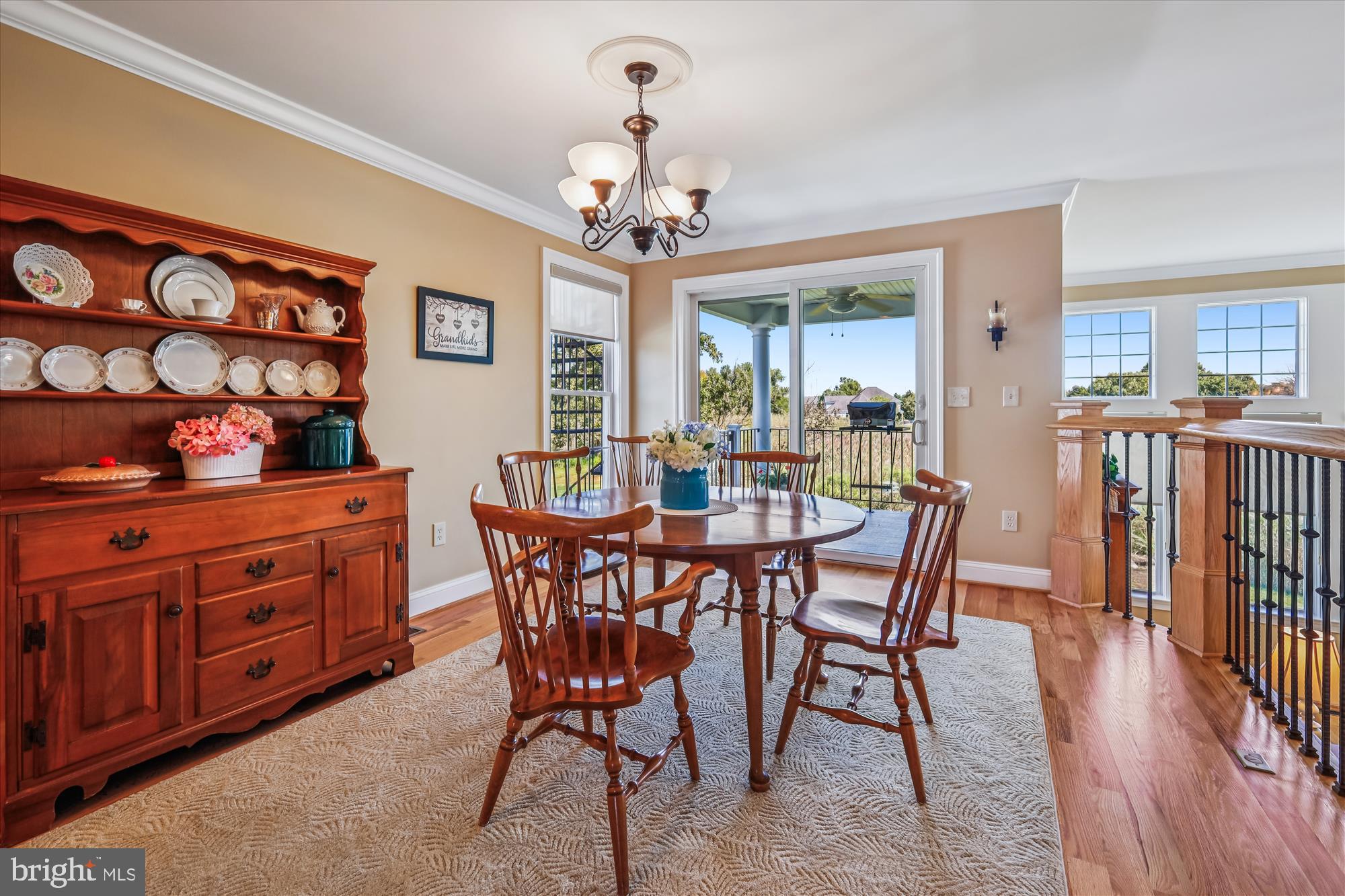 635 Dominion Road Chester, MD 21619 - Photo 23 of 50 a view of a dining room with furniture and wooden floor