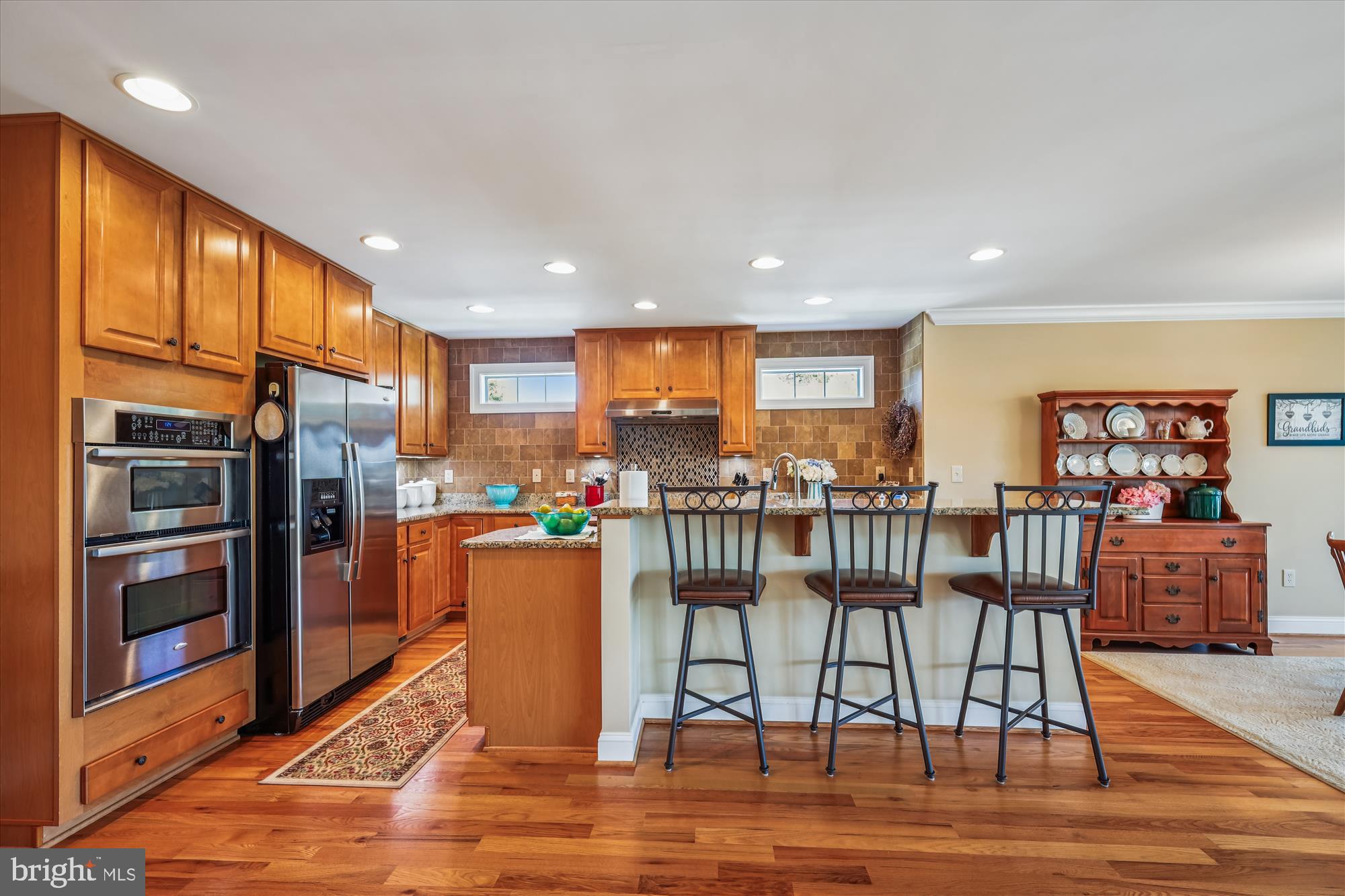 635 Dominion Road Chester, MD 21619 - Photo 28 of 50 a view of a kitchen with furniture and wooden floor