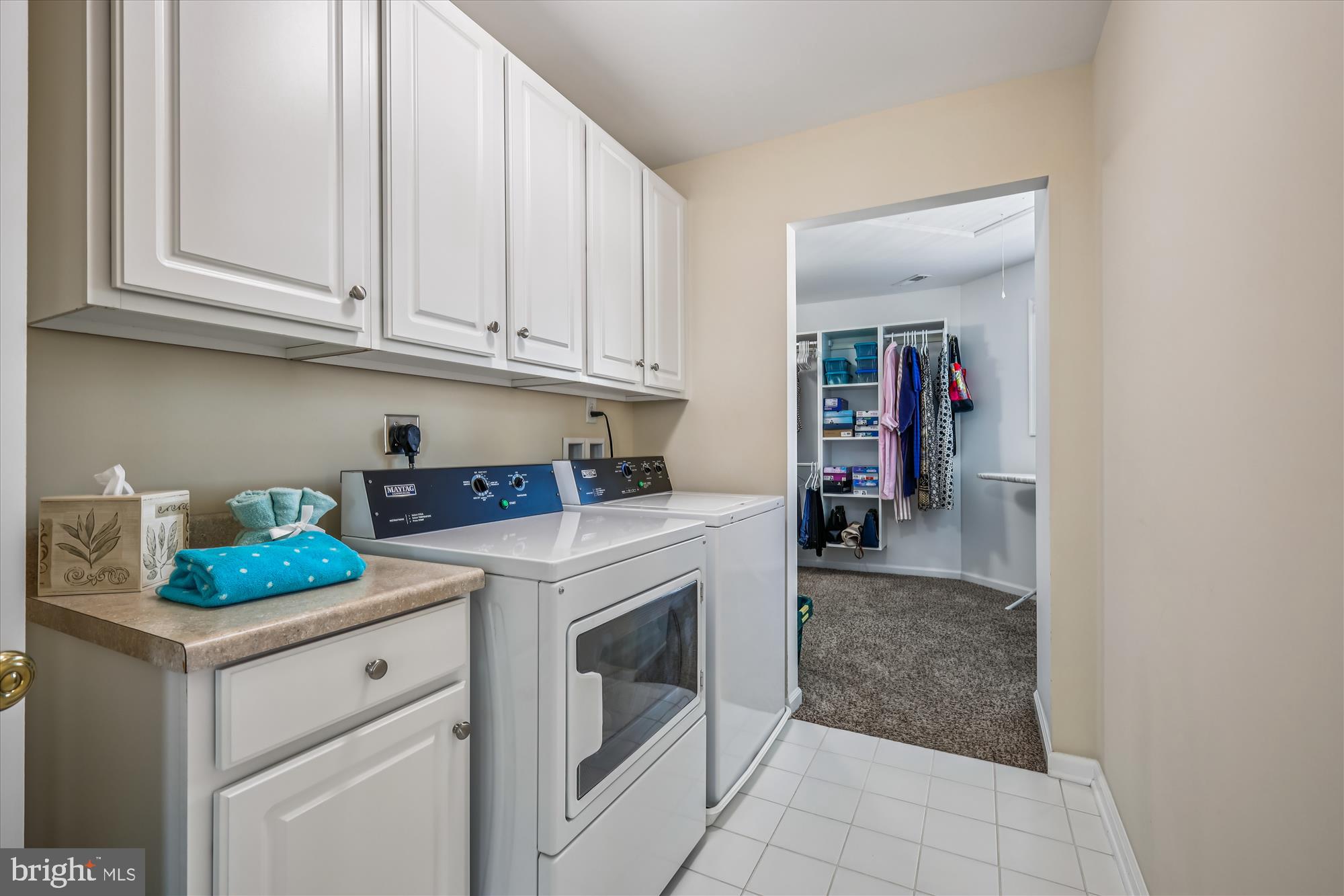 635 Dominion Road Chester, MD 21619 - Photo 39 of 50 a kitchen with white cabinets and white appliances