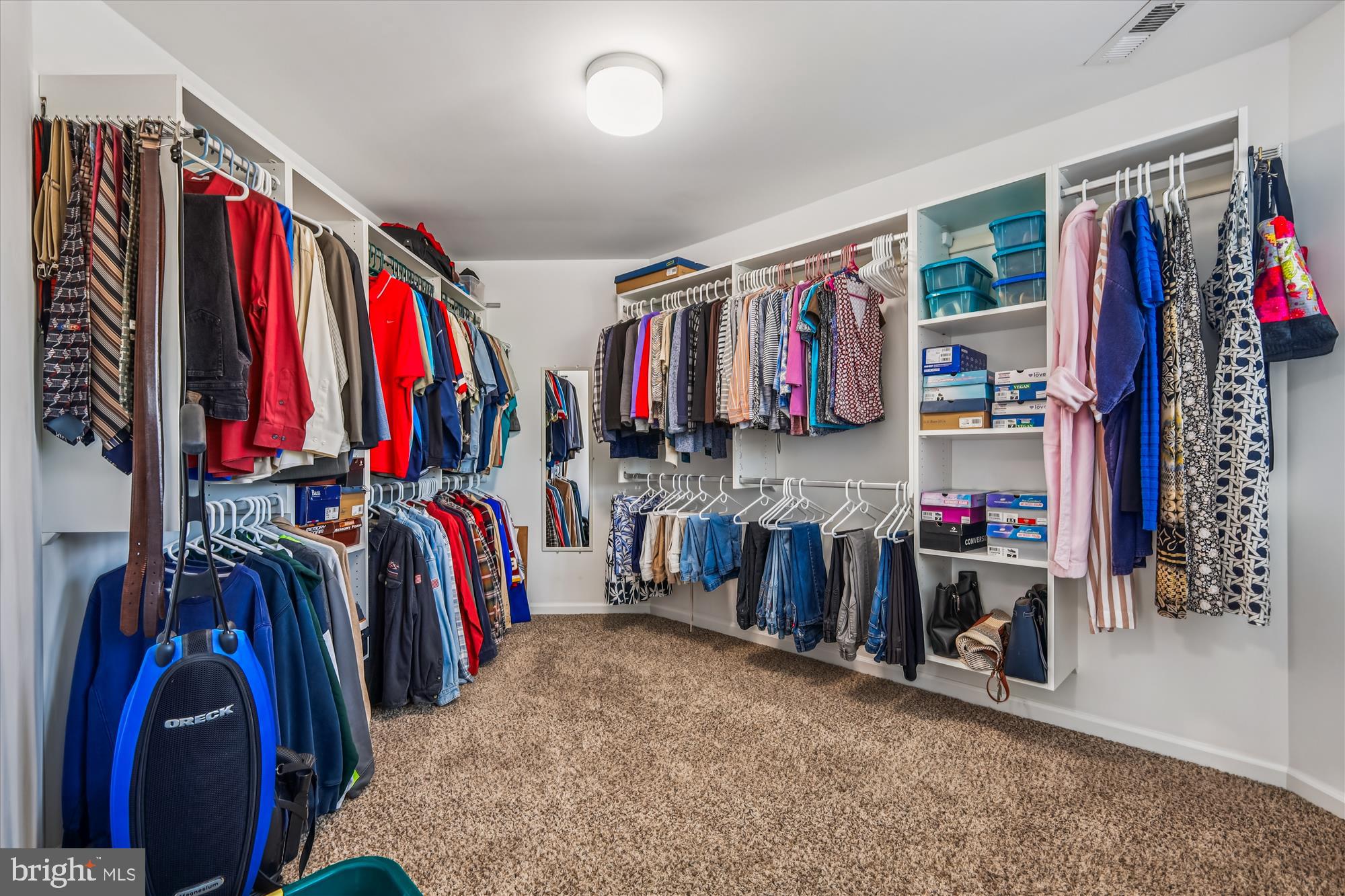 635 Dominion Road Chester, MD 21619 - Photo 42 of 50 a view of walk in closet with clothes