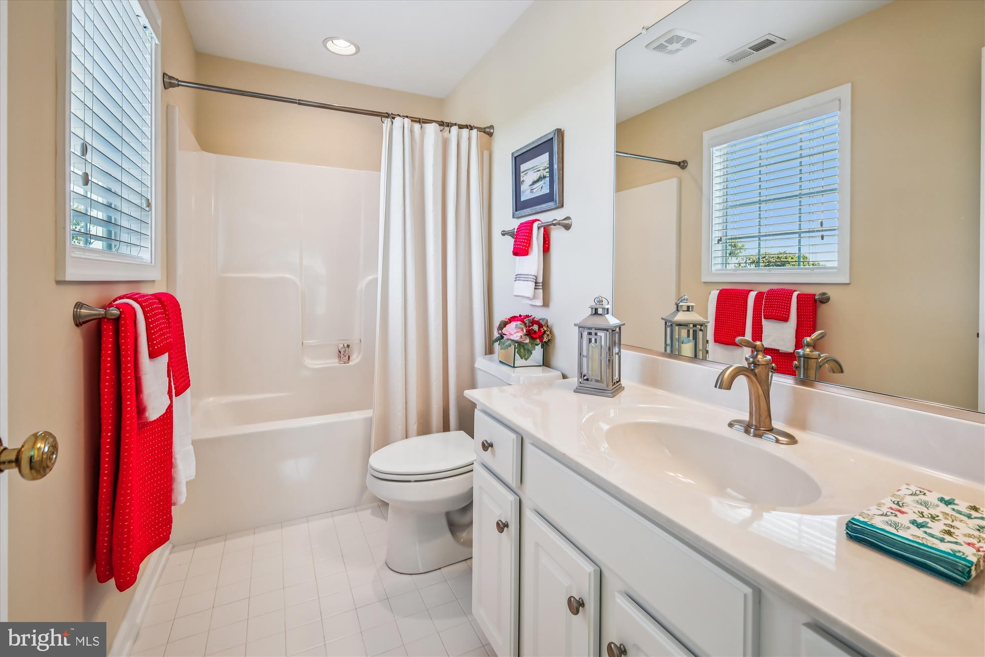 635 Dominion Road Chester, MD 21619 - Photo 45 of 50 a bathroom with a sink toilet vanity and tub