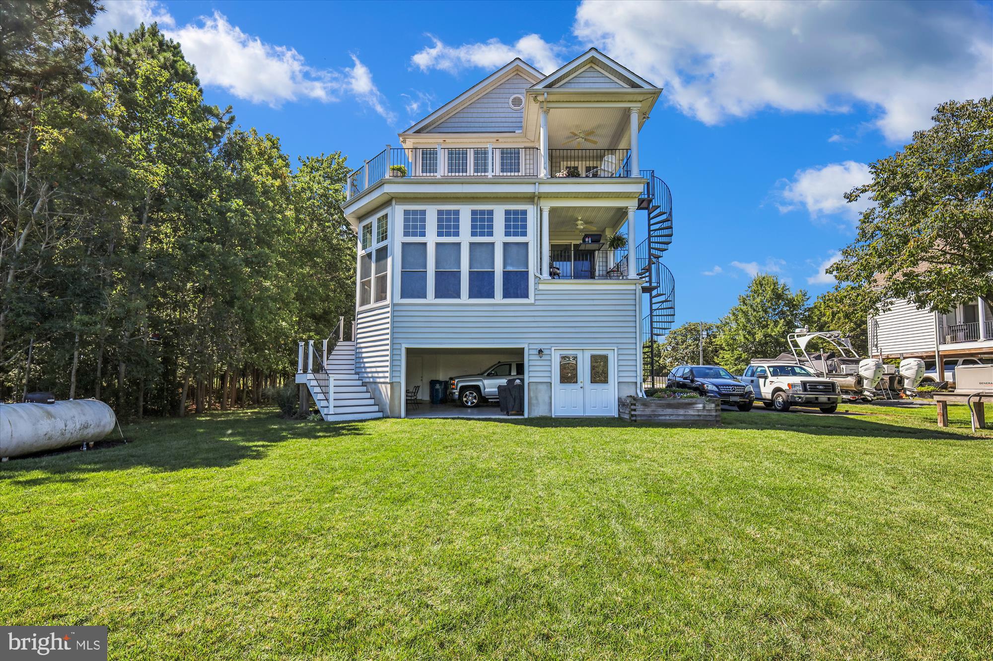 635 Dominion Road Chester, MD 21619 - Photo 8 of 50 a view of a house with a yard and sitting area