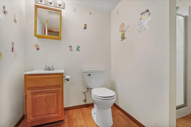 a bathroom with a toilet and a sink