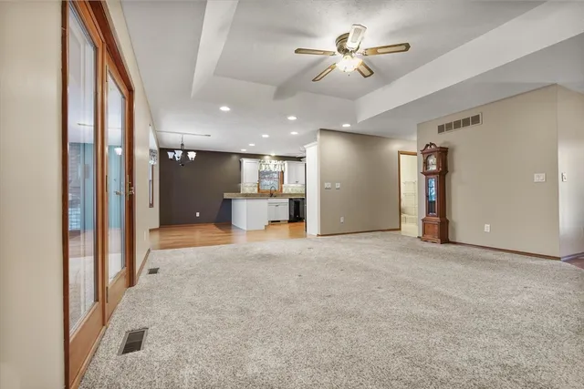 a view of a livingroom with a kitchen