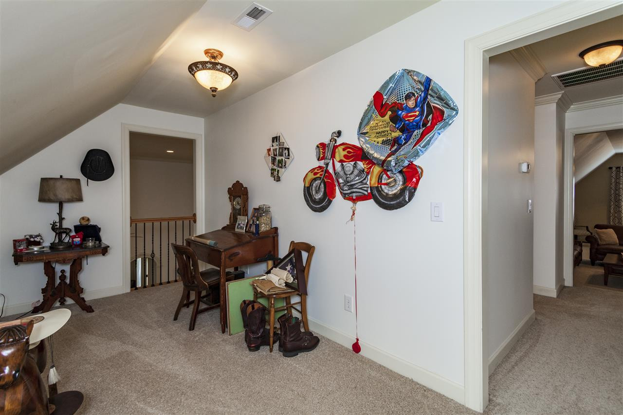 1700 Struble Circle Willow Spring, NC 27592 - Photo 19 of 25 Great space, can be utilized as an office, library, sewing room, homework area, and or anything you want! Loft