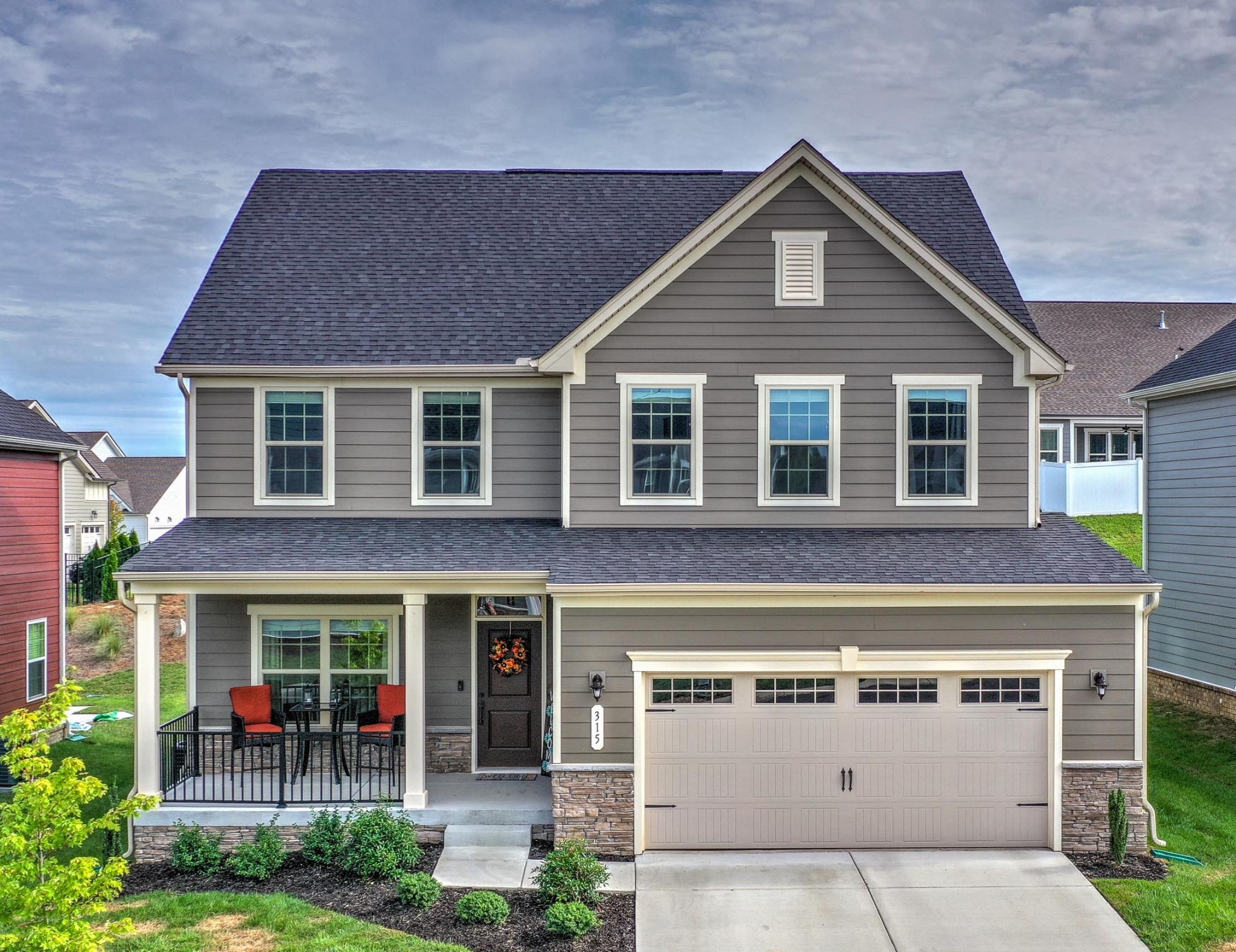 315 Collier Road Mount Juliet, TN 37122 - Photo 1 of 34 a front view of a house with garden