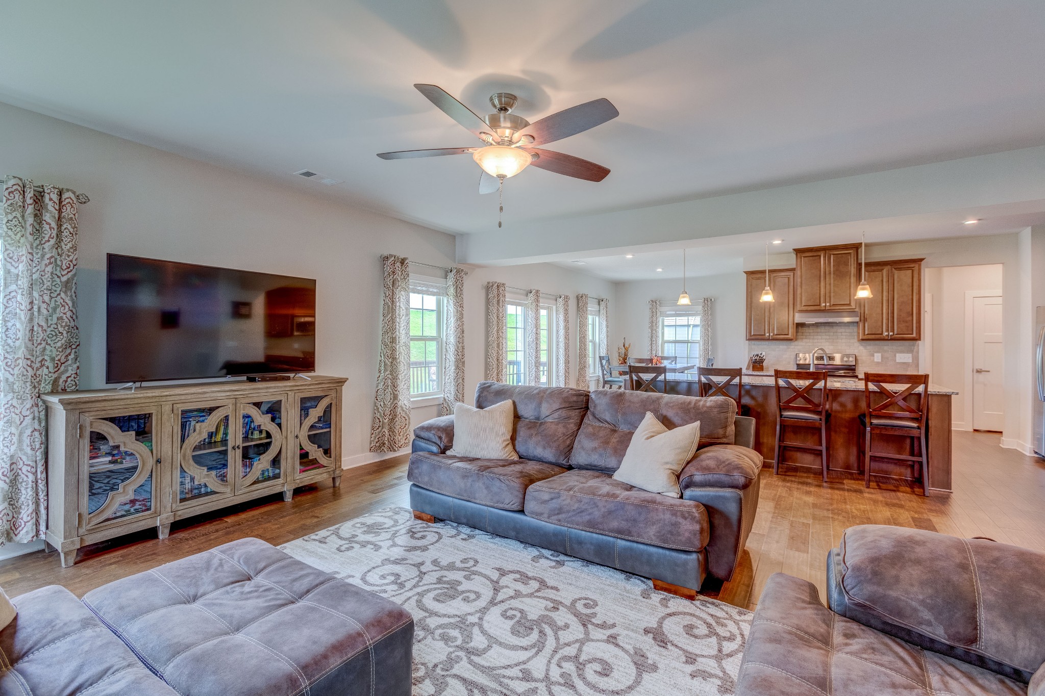 315 Collier Road Mount Juliet, TN 37122 - Photo 2 of 34 a living room with furniture and a flat screen tv