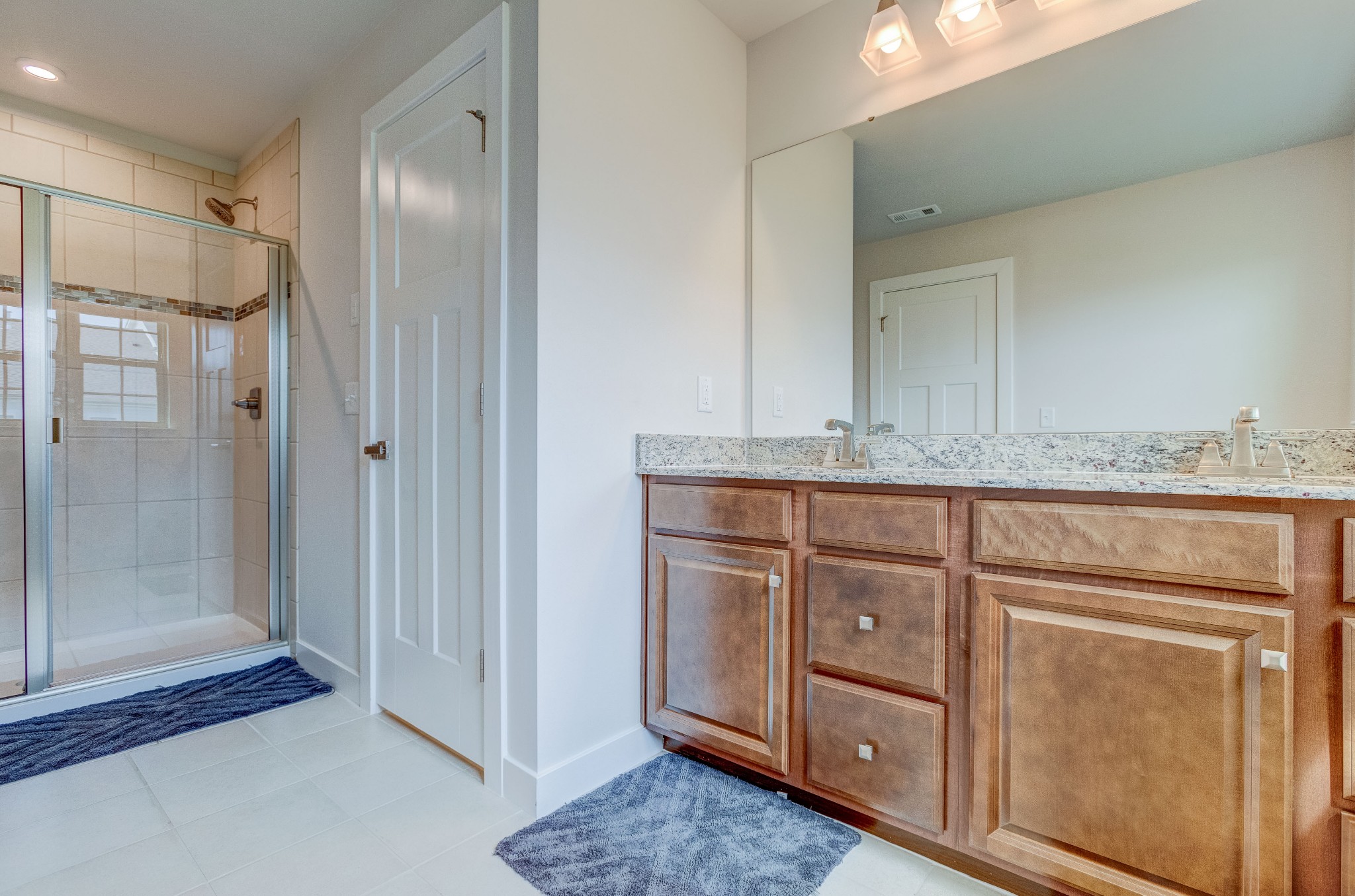 315 Collier Road Mount Juliet, TN 37122 - Photo 19 of 34 a bathroom with a granite countertop sink and a mirror