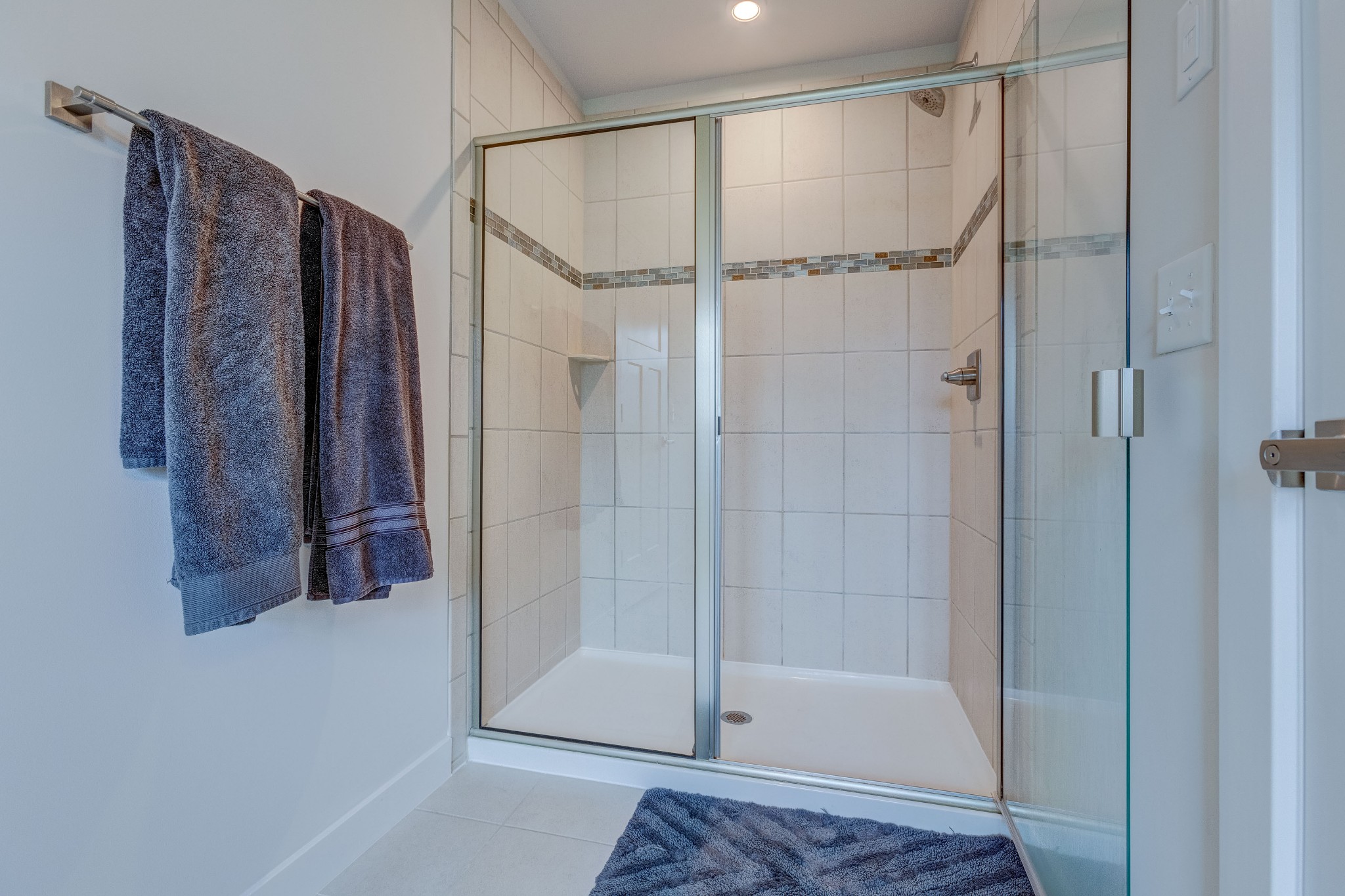 315 Collier Road Mount Juliet, TN 37122 - Photo 20 of 34 a bathroom with a shower and a glass door