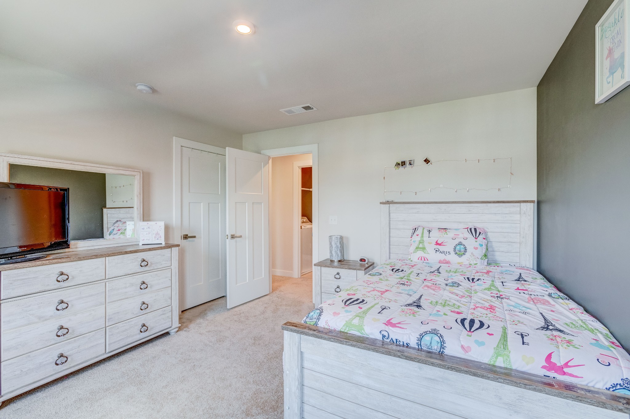 315 Collier Road Mount Juliet, TN 37122 - Photo 22 of 34 a bedroom with a bed and a flat screen tv
